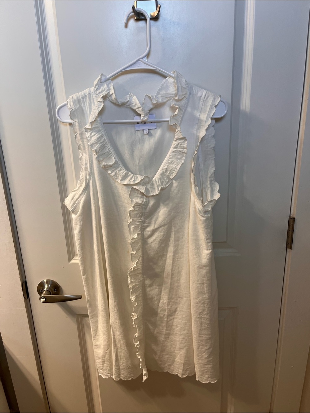 Ruffled white linen dress